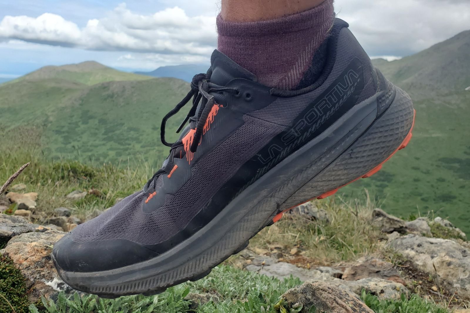 A closeup of the lacing system on a pair of running shoes.