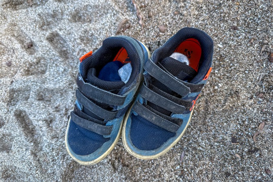 Top view of Five Ten Freerider shoes showing Velcro straps and sand-covered uppers.