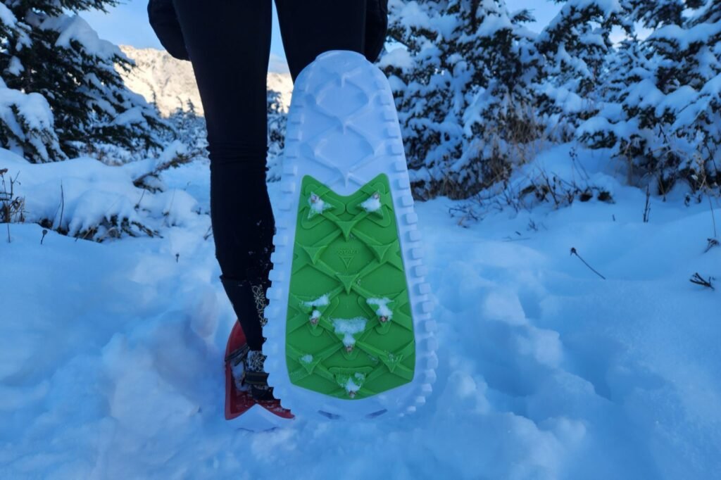 A closeup of the traction of snowshoes.