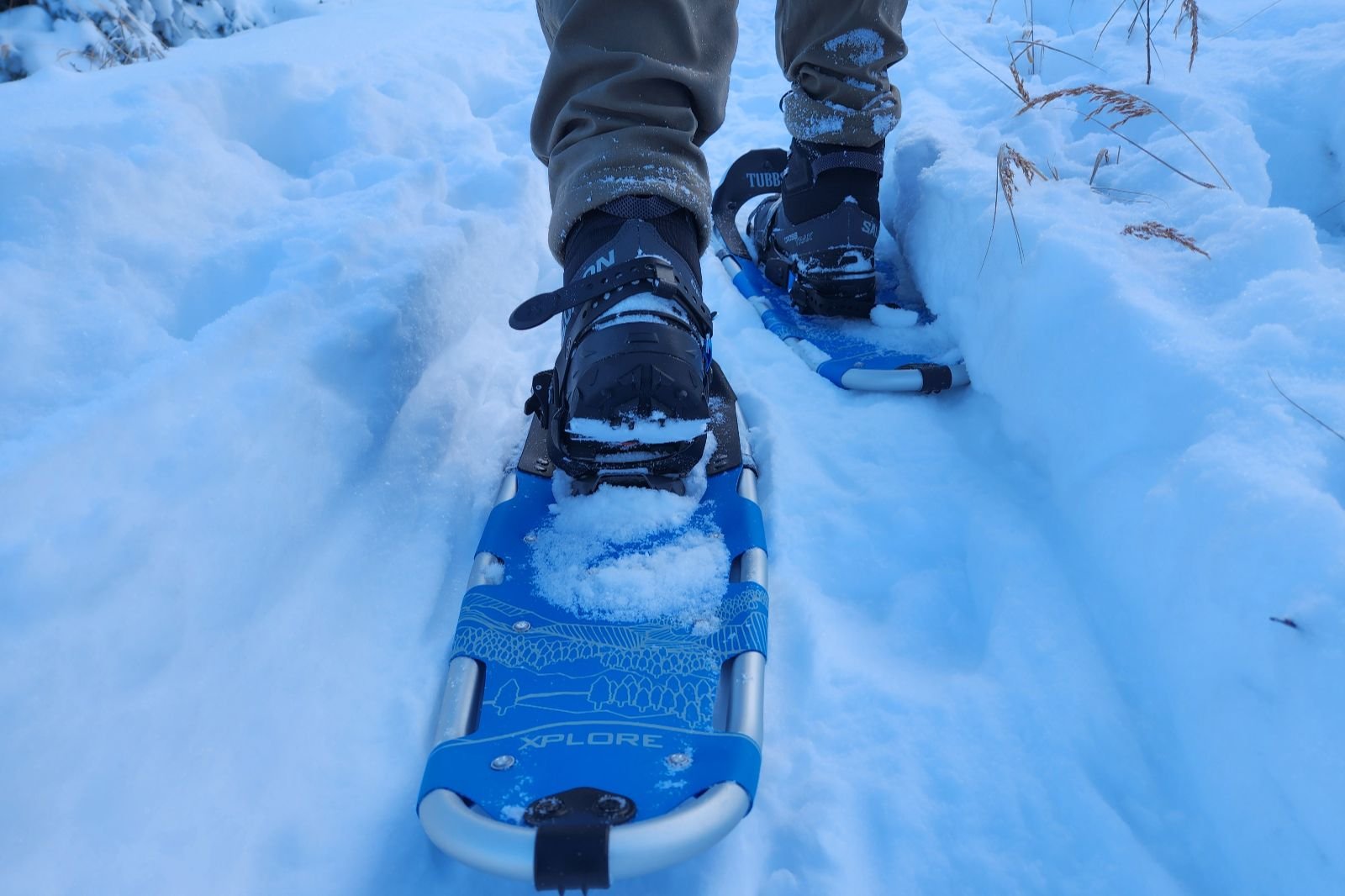 A closeup of the tails of snowshoes.